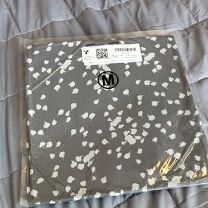 Gray and White Patterned Fabric